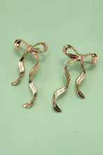Load image into Gallery viewer, HAMMERED LONG BOW RIBBON DROP EARRINGS
