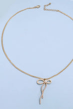Load image into Gallery viewer, PEARL EMBELLISHED BOW PENDANT NECKLACE