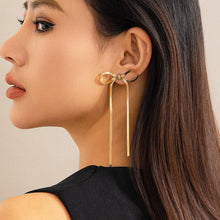 Load image into Gallery viewer, HERRINGBONE SNAKE CHAIN LONG BOW EARRINGS | SILVER